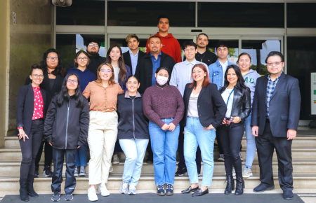 ELAC students take a group photo on the steps of 51ݶs' Westmoreland building with Heidy Caceres and SWLAW student panelists. 